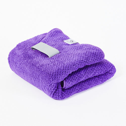 purple-fast-dry-microfiber-hair-towel-folded-into-a-square