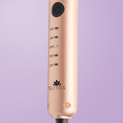 close-up-of-rose-gold-ez-glider-5-LED-temperature-settings-black-power-button-and-black-Sutra-logo