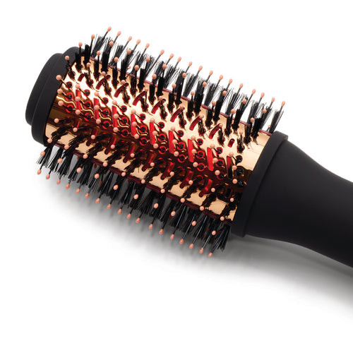 close-up-of-barrel-and-red-infrared-light-inside-barrel-mixed-bristles