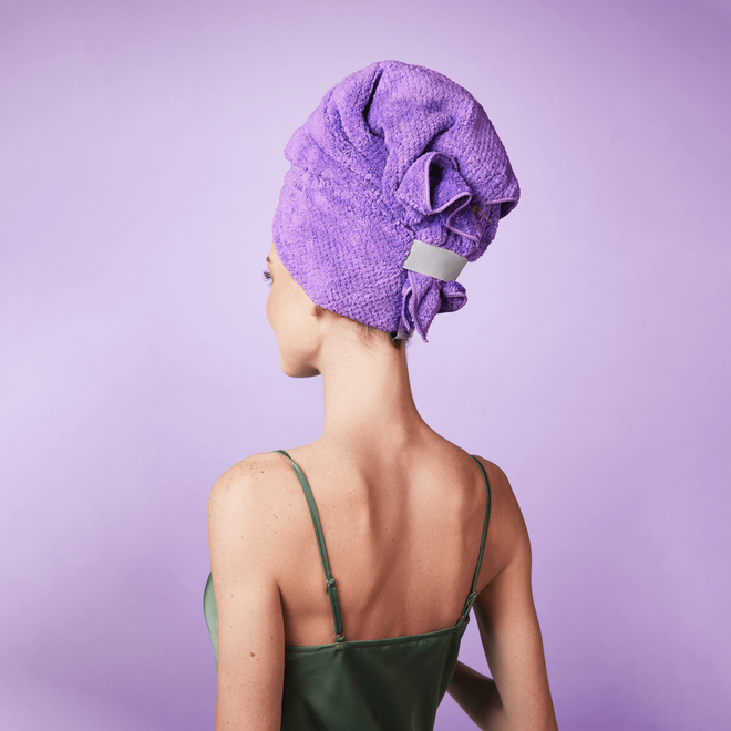blonde-hair-model-wearing-purple-microfiber-towel-on-head